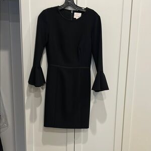 Like new condition Cinq a Sept black Dress with Flared  bell sleeves. Size 4